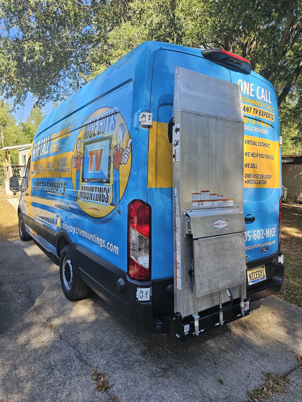 The Nice Guys branded delivery van with its rear liftgate