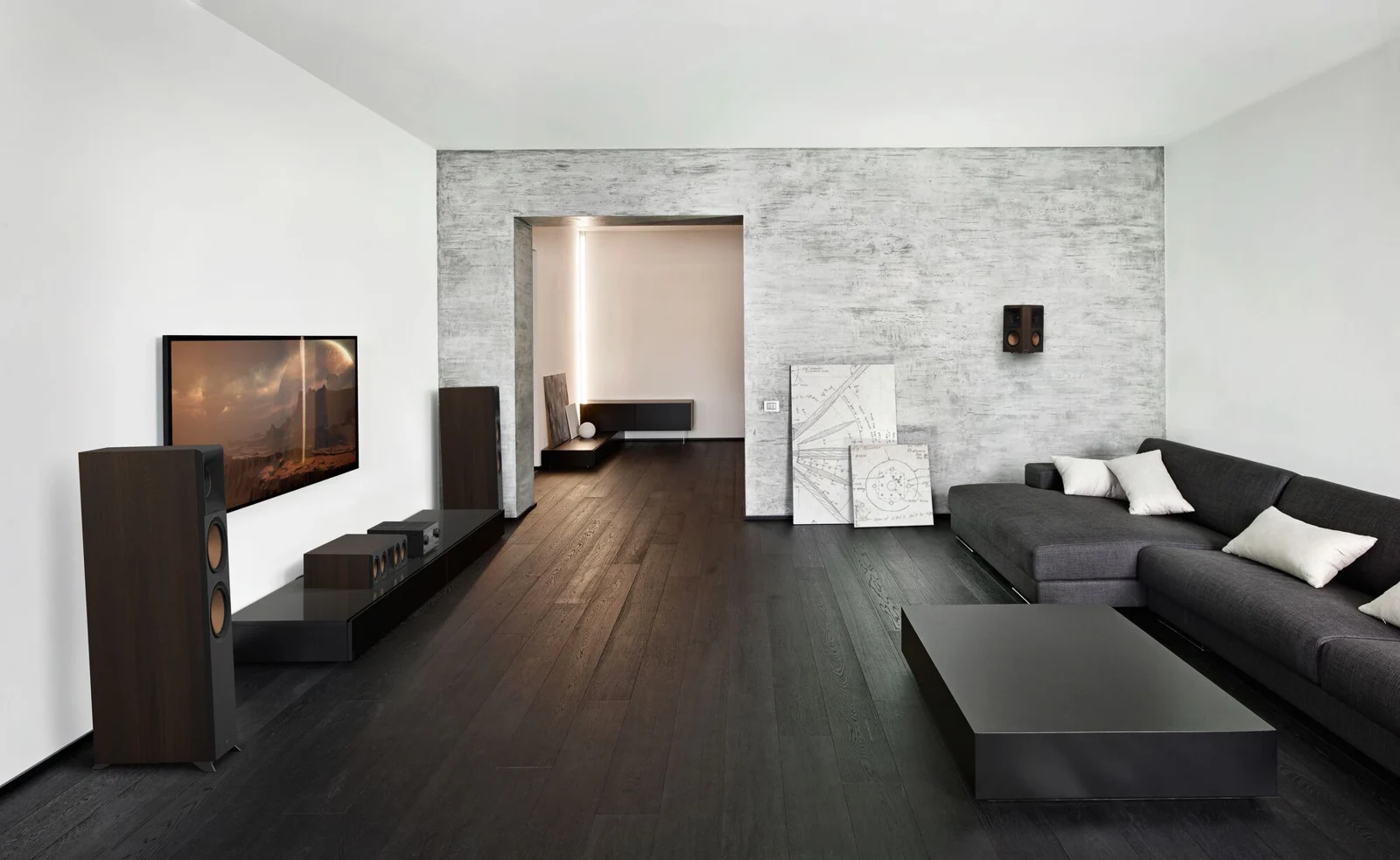 Klipsch Reference Premiere room with front, center and surround speakers and equipment console