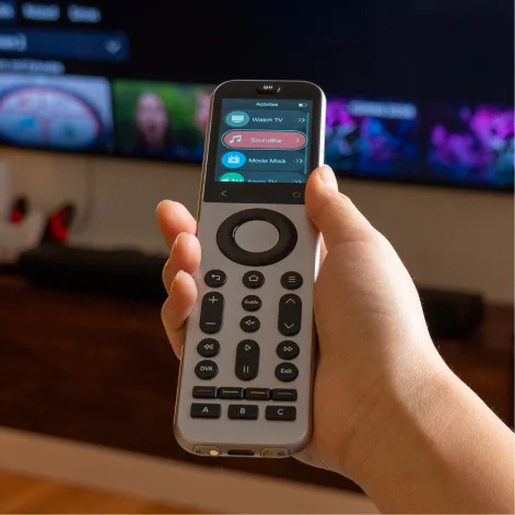 An identifiable SofaBaton X2 remote in use